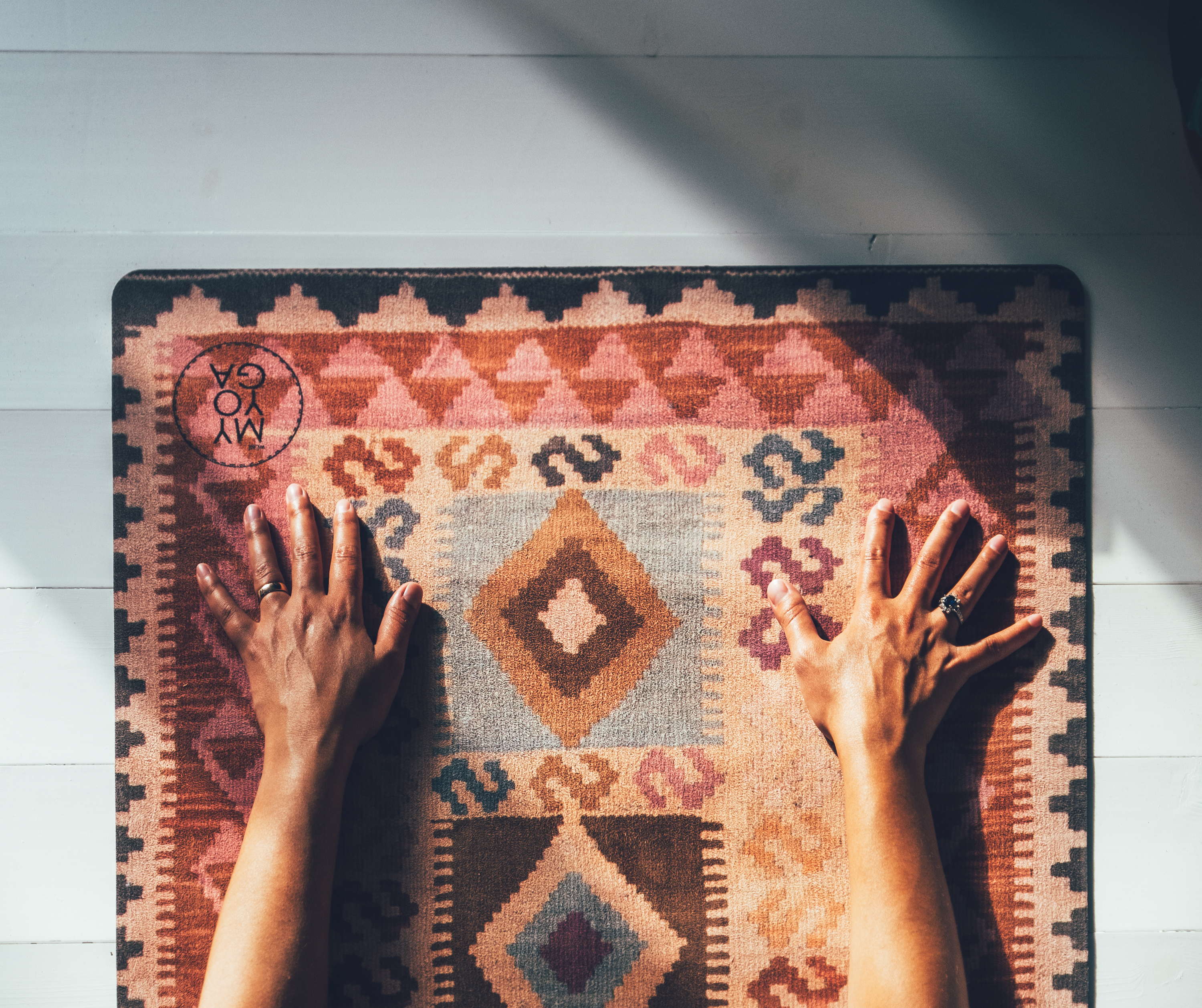Yoga mat that look like a kilim mat in pink colors.
