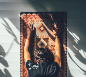 Yoga mat that look like a kilim mat in pink colors.