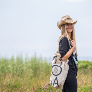 Girl with a WMY tote bag