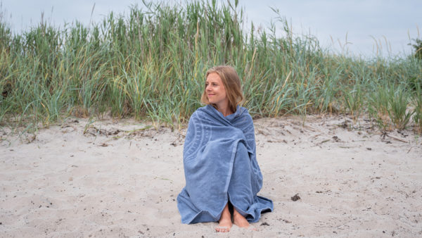 Girl wrapped in Hamsa Beach towel
