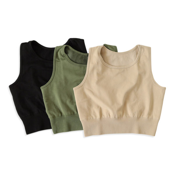 Seamless sports Bra, in color light sand, green and black.